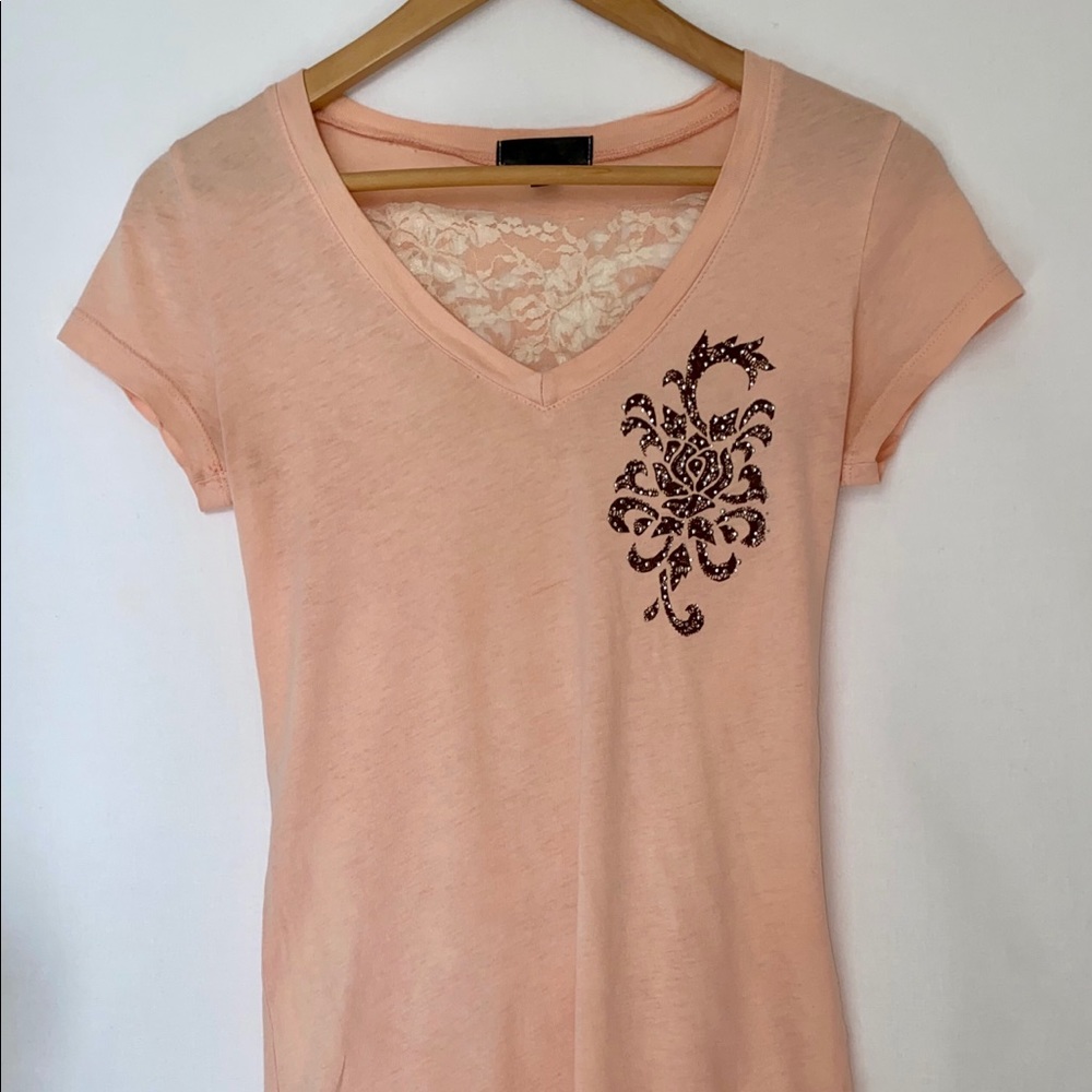 Top with a sheer patterned back